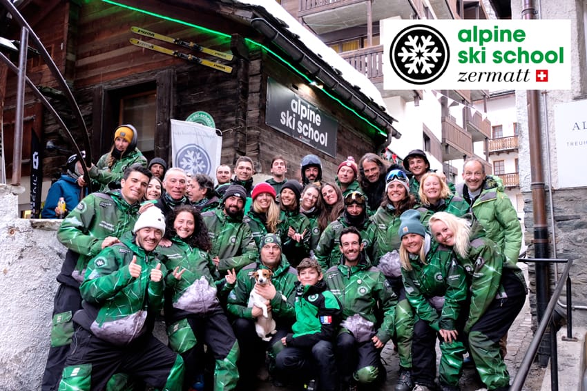 Alpine Ski School instructors gathered outside the Zermatt chalet-office